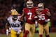 SAN FRANCISCO, CA - JANUARY 12: Quarterback Colin Kaepernick #7 of the San Francisco 49ers runs the ball against nose tackle B.J. Raji #90 of the Green Bay Packers during the NFC Divisional Playoff Game at Candlestick Park on January 12, 2013 in San Fran