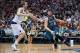 Nov 30, 2013; Dallas, TX, USA; Minnesota Timberwolves power forward Kevin Love (42) drives to the basket past Dallas Mavericks power forward Dirk Nowitzki (41) during the game at the American Airlines Center. The Timberwolves defeated the Mavericks 112-10