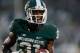 EAST LANSING, MI - NOVEMBER 02: Darqueze Dennard #31 of the Michigan State Spartans celebrates his fourth-quarter interception against the Michigan Wolverines at Spartan Stadium on November 2, 2013 in East Lansing, Michigan. Michigan State won the game 2