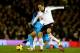 LONDON, ENGLAND - DECEMBER 04: Sandro of Tottenham Hotspur battles with Dimitar Berbatov of Fulham during the Barclays Premier League match between Fulham and Tottenham Hotspur at Craven Cottage on December 4, 2013 in London, England. (Photo by Paul Gil