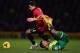 NORWICH, ENGLAND - DECEMBER 28: Martin Olsson of Norwich City tangles with Javier Hernandez of Manchester United during the Barclays Premier League match between Norwich City and Manchester United at Carrow Road on December 28, 2013 in Norwich, England.