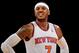 NEW YORK, NY - DECEMBER 16: Carmelo Anthony #7 of the New York Knicks looks on during the second half against the Washington Wizards at Madison Square Garden on December 16, 2013 in New York City. NOTE TO USER: User expressly acknowledges and agrees that