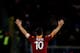 ROME, ITALY - MARCH 17: Francesco Totti of AS Roma greets his fans seen from behind during the Serie A match between AS Roma and Parma FC at Stadio Olimpico on March 17, 2013 in Rome, Italy. (Photo by Paolo Bruno/Getty Images)