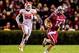Nov 30, 2013; Columbia, SC, USA; South Carolina Gamecocks quarterback Connor Shaw (14) scrambles for a first down as Clemson Tigers defensive end Corey Crawford (93) pursues in the second quarter at Williams-Brice Stadium. Mandatory Credit: Jeff Blake-USA