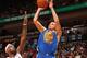 MIAMI, FL - JANUARY 01: Stephen Curry #30 of the Golden State Warriors shoots against LeBron James #6 of the Miami Heat on January 1, 2011 at American Airlines Arena in Miami, Florida. NOTE TO USER: User expressly acknowledges and agrees that, by download