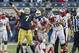 Dec 28, 2013; Bronx, NY, USA; Notre Dame Fighting Irish defensive end Stephon Tuitt (7) celebrates after sacking Rutgers Scarlet Knights quarterback Chas Dodd (19) in the fourth quarter of the Pinstripe Bowl at Yankee Stadium. Notre Dame won 29-16. Mandat