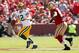 Sep 8, 2013; San Francisco, CA, USA; Green Bay Packers quarterback Aaron Rodgers (12) is chased by San Francisco 49ers defensive tackle Ray McDonald (91) in the second quarter at Candlestick Park. The 49ers defeated the Packers 34-28. Mandatory Credit: Ca