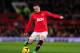 MANCHESTER, ENGLAND - DECEMBER 21: Wayne Rooney of Manchester United in action during the Barclays Premier League match between Manchester United and West Ham United at Old Trafford on December 21, 2013 in Manchester, England. (Photo by Stu Forster/Gett