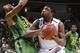 SAN JOSE, CA - MARCH 21: Marcus Smart #33 of the Oklahoma State Cowboys looks to shoot against Carlos Emory #33 of the Oregon Ducks in the second half during the second round of the 2013 NCAA Men's Basketball Tournament at HP Pavilion on March 21, 2013 i