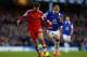 LIVERPOOL, ENGLAND - DECEMBER 29: Adam Lallana of Southampton competes with Ross Barkley of Everton during the Barclays Premier League match between Everton and Southampton at Goodison Park on December 29, 2013 in Liverpool, England. (Photo by Paul Thom