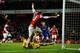 LONDON, ENGLAND - JANUARY 01: Nicklas Bendtner of Arsenal turns away in celebration as he scores their first goal past goalkeeper David Marshall of Cardiff City (grounded) during the Barclays Premier League match between Arsenal and Cardiff City at Emira