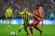 LONDON, ENGLAND - MAY 25: Marco Reus of Borussia Dortmund (L) in action with Jerome Boateng of Bayern Muenchen during the UEFA Champions League final match between Borussia Dortmund and FC Bayern Muenchen at Wembley Stadium on May 25, 2013 in London, Uni