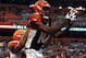 CLEVELAND, OH - OCTOBER 14: Wide receiver A.J. Green #18 of the Cincinnati Bengals catches a pass in front of defensive back Joe Haden #23 of the Cleveland Browns at Cleveland Browns Stadium on October 14, 2012 in Cleveland, Ohio. (Photo by Matt Sulliva