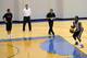 WASHINGTON - JUNE 17: NBA draft prospect John Wall (R) prepares to shoot a free throw in front of Washington Wizards assistant coaches Ryan Saunders (L), Randy Whitman (2nd-L) and head coach Flip Saunders (2nd-R) during a private session at the Verizon C