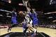 Jan 2, 2014; San Antonio, TX, USA; San Antonio Spurs guard Tony Parker (9) passes the ball under the basket against the New York Knicks during the first half at AT&T Center. Mandatory Credit: Soobum Im-USA TODAY Sports