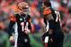 Dec 29, 2013; Cincinnati, OH, USA; Cincinnati Bengals quarterback Andy Dalton (14) celebrates after a touchdown with tackle Anthony Collins (73) during the third quarter against the Baltimore Ravens at Paul Brown Stadium. The Bengals won 34-17. Mandatory
