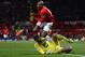 MANCHESTER, ENGLAND - JANUARY 01: Hugo Lloris of Tottenham Hotspur collides with Ashley Young of Manchester United during the Barclays Premier League match between Manchester United and Tottenham Hotspur at Old Trafford on January 1, 2014 in Manchester,