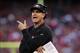 Dec 1, 2013; San Francisco, CA, USA; San Francisco 49ers head coach Jim Harbaugh talks to a referee between plays against the St. Louis Rams in the fourth quarter at Candlestick Park. The 49ers defeated the Rams 23-13. Mandatory Credit: Cary Edmondson-USA