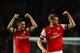 LONDON, ENGLAND - NOVEMBER 02: Laurent Koscielny of Arsenal and Per Mertesacker of Arsenal celebrate victory at the final whistle during the Barclays Premier League match between Arsenal and Liverpool at Emirates Stadium on November 2, 2013 in London, En