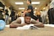 OKLAHOMA CITY, OK - JUNE 12: LeBron James #6 of the Miami Heat reads a book in the locker room prior to Game One of the 2012 NBA Finals against Oklahoma City Thunder at the Chesapeake Energy Arena on June 12, 2012 in Oklahoma City, Oklahoma. NOTE TO USER: