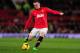 MANCHESTER, ENGLAND - DECEMBER 21: Wayne Rooney of Manchester United in action during the Barclays Premier League match between Manchester United and West Ham United at Old Trafford on December 21, 2013 in Manchester, England. (Photo by Stu Forster/Gett