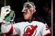 UNIONDALE, NY - DECEMBER 28: Cory Schneider #35 of the New Jersey Devils looks on against the New York Islanders during a game at the Nassau Veterans Memorial Coliseum on December 28, 2013 in Uniondale, New York. (Photo by Alex Trautwig/Getty Images)