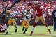 SAN FRANCISCO, CA - SEPTEMBER 08: Quarterback Colin Kaepernick #7 of the San Francisco 49ers is pursued by Micah Hyde #33 and Mike Neal #96 of the Green Bay Packers at Candlestick Park on September 8, 2013 in San Francisco, California. (Photo by Jeff Gr