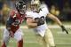 Sep 8, 2013; New Orleans, LA, USA; New Orleans Saints tight end Jimmy Graham (80) carries the ball on a reception against Atlanta Falcons free safety Thomas DeCoud (28) during the second quarter at the Mercedes-Benz Superdome. Mandatory Credit: John David