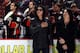 ANAHEIM, CA - DECEMBER 3: Gene Simmons (left) and Paul Stanley stand during the national anthem in celebration of KISSmas night prior to the game between the Los Angeles Kings and the Anaheim Ducks on December 3, 2013 at Honda Center in Anaheim, Californ