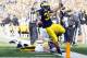November 17, 2012; Ann Arbor, MI, USA; Michigan Wolverines running back Thomas Rawls (38) runs the ball against the Iowa Hawkeyes in the second quarter at Michigan Stadium. Mandatory Credit: Rick Osentoski-USA TODAY Sports