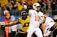 ARLINGTON, TX - JANUARY 03: Quarterback Clint Chelf #10 of the Oklahoma State Cowboys throws the ball as Kony Ealy #47 of the Missouri Tigers rushes in during the second half during the AT&T Cotton Bowl on January 3, 2014 in Arlington, Texas. (Photo by