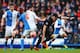 BLACKBURN, ENGLAND - JANUARY 04: Grant Hanley (L) of Blackburn Rovers and Alvaro Negredo (R) of Manchester City challenge for the ball during the Budweiser FA Cup third round match between Blackburn Rovers and Manchester City at Ewood Park on January 4,