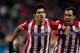MADRID, SPAIN - DECEMBER 21: Diego Costa (L) of Atletico de Madrid celebrates scoring their second goal with team-mate Diego Godin (R) during the La Liga match between Club Atletico de Madrid and Levante UD at Vicente Calderon Stadium on December 21, 201