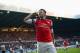 NEWCASTLE UPON TYNE, ENGLAND - DECEMBER 29: Olivier Giroud of Arsenal celebrates scoring the opening goal during the Barclays Premier League match between Newcastle United and Arsenal at St James' Park on December 29, 2013 in Newcastle upon Tyne, England