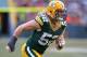 GREEN BAY, WI - NOVEMBER 24: Clay Matthews #52 of the Green Bay Packers rushes against the Minnesota Vikings at Lambeau Field on November 24, 2013 in Green Bay, Wisconsin. The Vikings and the Packers tied 26-26 after overtime. (Photo by Jonathan Daniel/G