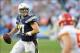 Dec 29, 2013; San Diego, CA, USA; San Diego Chargers quarterback Philip Rivers (17) rolls out of the pocket in overtime against the Kansas City Chiefs at Qualcomm Stadium. The Chargers won 27-24 in overtime. Mandatory Credit: Christopher Hanewinckel-USA T