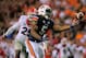 Nov 16, 2013; Auburn, AL, USA; Auburn Tigers wide receiver Ricardo Louis (5) catches a tipped ball by Georgia Bulldogs defensive back Josh Harvey-Clemons (25) and scores the game winning touchdown at Jordan Hare Stadium. The Tigers defeated the Bulldogs 4