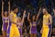 Jan 3, 2014; Los Angeles, CA, USA; Los Angeles Lakers guards Nick Young (0) and Kendall Marshall (20) celebrate in the final minute against the Utah Jazz at Staples Center. The Lakers defeated the Jazz 110-99. Mandatory Credit: Kirby Lee-USA TODAY Sports