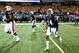Dec 7, 2013; Atlanta, GA, USA; Auburn Tigers quarterback Nick Marshall (14) runs onto the field prior to the 2013 SEC Championship game against the Missouri Tigers at Georgia Dome. Mandatory Credit: John David Mercer-USA TODAY Sports