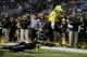 Jan 4, 2014; San Antonio, TX, USA; West wide receiver Frank Iheanacho (15) is tackled by East defensive back Erick Smith (22) during U.S. Army All-American Bowl high school football game at the Alamodome. Mandatory Credit: Soobum Im-USA TODAY Sports