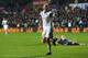 SWANSEA, WALES - DECEMBER 04: Jonjo Shelvey (R) of Swansea City celebrates scoring his sides second goal during the Barclays Premier League match between Swansea City and Newcastle United at the Liberty Stadium on December 4, 2013 in Swansea, Wales. (Ph