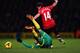NORWICH, ENGLAND - DECEMBER 28: Martin Olsson of Norwich City tangleds with Javier Hernandez of Manchester United during the Barclays Premier League match between Norwich City and Manchester United at Carrow Road on December 28, 2013 in Norwich, England