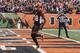 CINCINNATI, OH - DECEMBER 29: A.J. Green #18 of the Cincinnati Bengals scores a first half touchdown during the game against the Baltimore Ravens at Paul Brown Stadium on December 29, 2013 in Cincinnati, Ohio. The Bengals defeated the Ravens 34-17. (Ph