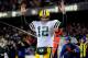 CHICAGO, IL - DECEMBER 29: Quarterback Aaron Rodgers #12 of the Green Bay Packers celebrates a touchdown against the Chicago Bears in the second quarter during a game at Soldier Field on December 29, 2013 in Chicago, Illinois. (Photo by David Banks/Getty