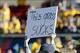 Jan 4, 2014; Frisco, TX, USA; A North Dakota State Bison fan holds up a sign commenting on the condition of the grass field during the game against the Towson Tigers at Toyota Stadium. Mandatory Credit: Tim Heitman-USA TODAY Sports