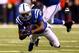 INDIANAPOLIS, IN - JANUARY 04: Wide receiver T.Y. Hilton #13 of the Indianapolis Colts carries the ball against the Kansas City Chiefs during a Wild Card Playoff game at Lucas Oil Stadium on January 4, 2014 in Indianapolis, Indiana. (Photo by Andy Lyons/