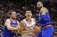 Jan 3, 2014; Houston, TX, USA; Houston Rockets point guard Jeremy Lin (7) drives to the basket during the second quarter as New York Knicks point guard Beno Udrih (18) and center Tyson Chandler (6) defend at Toyota Center. Mandatory Credit: Troy Taormina-