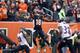CINCINNATI, OH - DECEMBER 29: A.J. Green #18 of the Cincinnati Bengals reaches up for a pass during the NFL game against the Baltimore Ravens at Paul Brown Stadium on December 29, 2013 in Cincinnati, Ohio. (Photo by Andy Lyons/Getty Images)