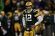 GREEN BAY, WI - JANUARY 15: Aaron Rodgers #12 of the Green Bay Packers looks on in the third quarter against the New York Giants during their NFC Divisional playoff game at Lambeau Field on January 15, 2012 in Green Bay, Wisconsin. (Photo by Jonathan Da