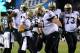 PHILADELPHIA, PA - JANUARY 04: Lance Moore #16 of the New Orleans Saints celebrates with teammates Brian De La Puente #60 after scoring a 24 yard touchdown thrown by Drew Brees #9 in the third quarter against the Philadelphia Eagles during their NFC Wild
